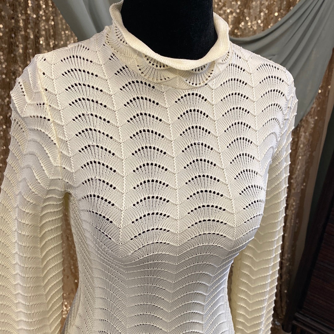 Pull près du corps